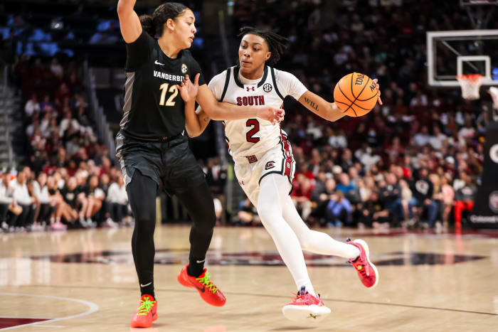 Ashlyn Watkins attempts to drive around Vanderbilt Commodores forward Khamil Pierre (28th Jan., 2024)